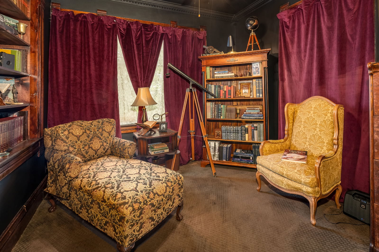 living room with antique furniture and decorations