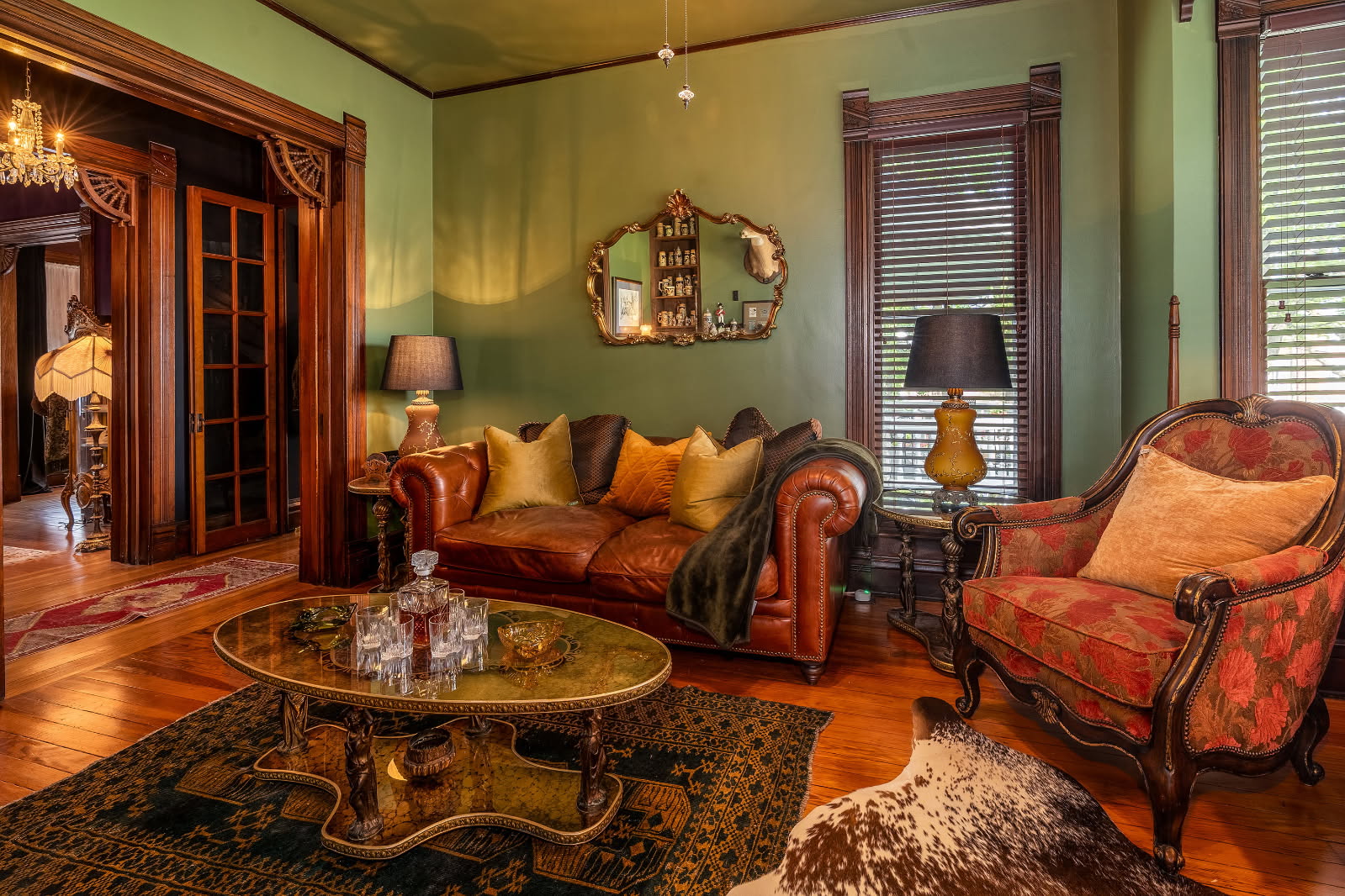 interior of living room with couch as focus and furniture near it